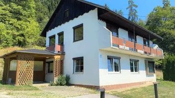 Expose Kärntens Seenregion - 2 Häuser auf großem Grundstück mit Wald