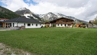 Expose Eben gelegenes Grundstück mit Blick auf die Buchensteinwand