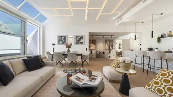 Helles, offenes Wohn- und Esszimmer mit moderner Deckenbeleuchtung und Zugang zur Dachterrasse.