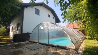Expose Moderne Eleganz in Wiens grüner Oase - Traumhaftes Einfamilienhaus mit Pool und Garage