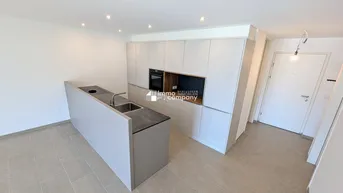 Expose Exklusive 3-Zimmer-Wohnung mit Südwest-Terrasse – moderner Küche und TG-Stellplatz