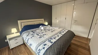 Expose Dachgeschosswohnung in 1040 Wien – modern, geräumig, mit Balkon!