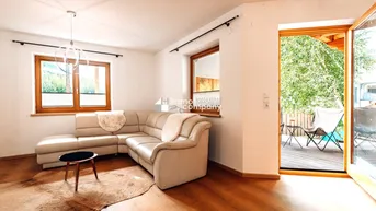 Expose WOHNEN AM SEE - Absolute Rarität in unmittelbarer Seenähe mit Bergblick - 5 Zimmer Erdgeschoßwohnung mit großzügigen Räumlichkeiten