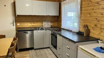 Expose Charmantes Ferienhaus mit Seezugang am Neufelder See – ganzjährig bewohnbar