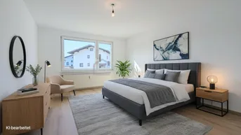 Helles Schlafzimmer mit modernem Bett, Teppich und Blick auf die Nachbarschaft.