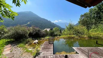 Expose Exklusives Luxus-Chalet mit Badeteich und Wellnesschalet in Panoramalage