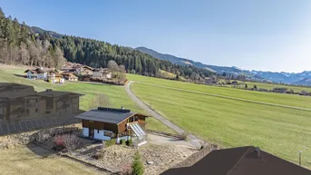 Expose Baugrundstück mit Altbestand in sonniger Aussichtslage