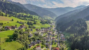 Expose Baugrundstück in Hanglage mit tollem Ausblick