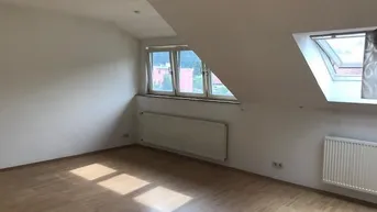 Expose Vierzimmer-Dachgeschoßwohnung in St. Martin!