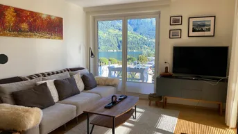 Expose Auserlesene Eleganz – 2 Zimmer Wohnung mit Seeblick, Garten, Terrasse und Balkon in Zell am See zu verkaufen