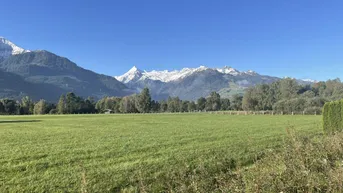 Expose Atemberaubendes Grundstück mit traumhaften Blick auf das Kitzsteinhorn am Golfplatz zu verkaufen