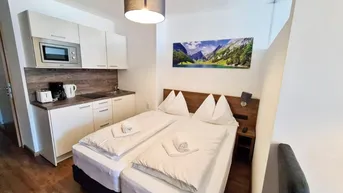 Expose Neubau Apartment "buy to let" in top Lage von Alpendorf - Skiliftnähe, Tiefgarage, Wellness