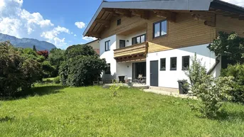 Expose 5760 Saalfelden: neu renoviertes Zweifamilienhaus in zentraler, ruhiger Lage von Saalfelden mit 2 Wohneinheiten, unterkellert, 2 Garagen und großem Garten