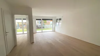 Expose Erstbezug: 3-Zimmer-Wohnung mit Garten direkt am Lohbach
