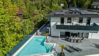 Expose Luxuriöse Doppelhaushälfte mit Pool und Seeblick in Fuschl