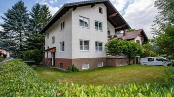 Expose Zweifamilienhaus mit großem Garten, KFZ-Stellplätzen, Carport und Garage