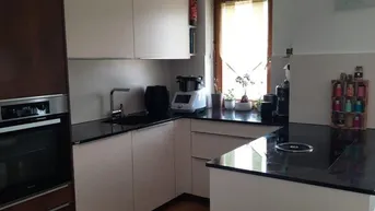 Expose 4 Zimmer Eigentumswohnung (ca. 113 m²) mit Wintergarten und Carport