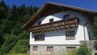 Expose Wohnhaus mit großer westseitiger Terrasse 2 Balkone und Garage, voll unterkellert!