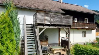 Expose Eigentumswohnung mit großer westseitiger Terrasse, Garten, Garage u. Parkplätze
