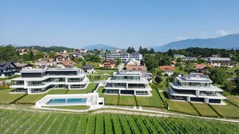Expose Luxuriöse Seeimmobilie am Faaker See: Exklusive Wohnung mit Privatstrand, Pool und eigenem Garten