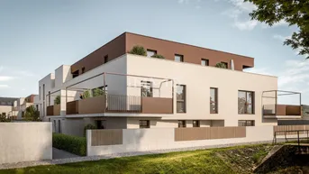 Moderne Wohnanlage mit klarer Architektur, großen Fenstern und Balkonen in ruhiger Umgebung.