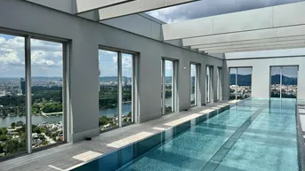 Expose Design trifft Ausblick - 2 Zimmer Wohnung mit Pool am DACH - U1 vor der Türe