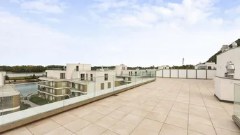Expose Meisterstück moderner Architektur: Penthouse mit 230m2 Terrasse &amp; Wasserblick