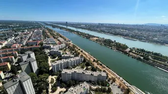Expose ERSTBEZUG: 2-Zimmer-Wohnung im 42. Stock mit freiem Blick auf die Alte Donau!