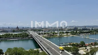 Expose ERSTBEZUG: Anlegerwohnung direkt an der neuen Donau mit herrlichem Stadtblick!