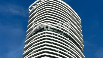 Expose ERSTBEZUG: TOP-Neubau mit schönstem Blick auf Neue Donau, Riesenrad &amp; Stephansdom: Gym, Pool uvm.