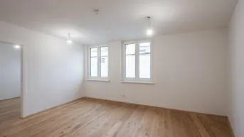 Expose ++Der Platzhirsch++ Fantastischer 2 Zimmer Erdgeschoss Erstbezug mit 21 m2 Terrasse auf dem Dach!