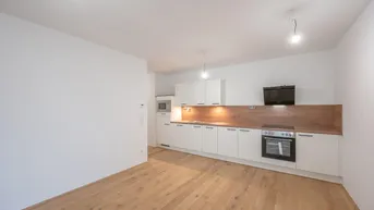 Expose ++Der Platzhirsch++ Fantastischer 2 Zimmer Erstbezug mit Terrasse und Garten!