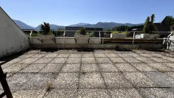 Expose Ferienwohnsitz – Eckwohnung mit riesiger Terrasse in Sonnenlage mit tollem Bergpanorama.