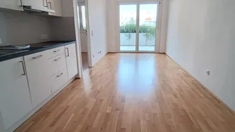 Expose MITTEN IN DER STADT Ruhe auf der begrünten Terrasse genießen - 2 Zimmer Neubauwohnung