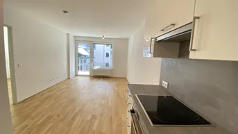 Expose Tolle Neubau-Wohnung mit großem Innenhof-Balkon nahe S-Bahn Jedlersdorf, Straßenbahn 26 und SCN mit Einbauküche und Abstellraum!