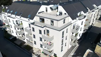 Expose Karmeliterhof - Neubauwohntraum beim Rathausplatz