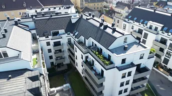Expose Moderne 3-Zimmer-Dachgeschosswohnung in idealer Lage! Karmeliterhof - Neubauwohntraum beim Rathausplatz