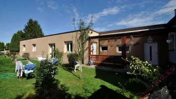 Expose Renoviertes Wohnhaus- und moderner Neubau (noch unvollendet) für zwei Familien