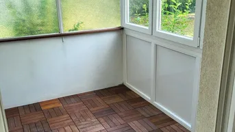 Expose Gemütliche Erdgeschoß-Wohnung mit verglaster Loggia