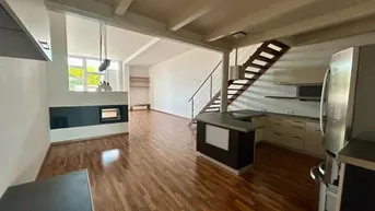 Expose Stilvolle Wohnung mit Loft-Charakter / Kamin, Dachterrasse mit Weitblick ins Grüne inklusive!