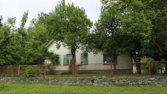 Expose Heiligenkreuz: Sanierungsbed. Bauernhaus mit Obstbaumbestand