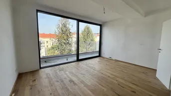 Expose Erstbezug: Moderne Dachgeschosswohnung mit Balkon und Lift in begehrter Lage nahe dem Lendplatz K6/11