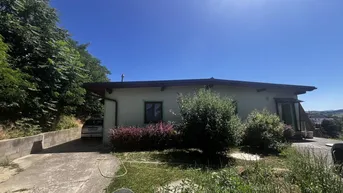 Expose "Goßflächiges Grundstück mit 2 Bungalowbauten und herrlichem Ausblick"