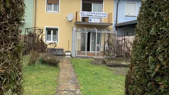 Expose Tolles Reihenhaus in guter Lage mit Grünfläche und Wintergarten