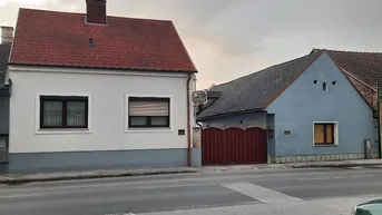 Expose Sollenau: Einfamilienhaus mit Nebengebäude und drei Garagen in zentraler Lage