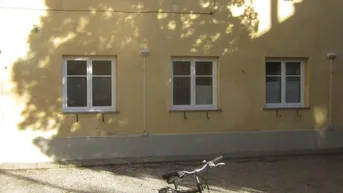 Expose Zweizimmer Erdgeschosswohnung mit Blick in den begrünten Innenhof