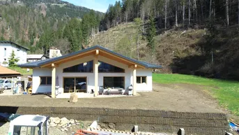 Expose Neuwertiges Holzmassiv-Wohnhaus mit Wohlfühlatmosphäre - in Fertigstellung