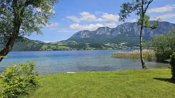 Expose Wohnen, wo andere Urlaub machen – 2-Zimmer-Traumwohnung am Attersee mit Badeplatz