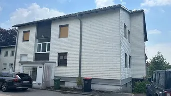 Expose Großzügige Wohnung mit Gartenterasse und Gartennutzung und Doppelgarage mit Fernblick SOFORT VERFÜGBAR