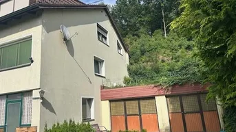 Expose 2 bis 3 Familienhaus mit Vollkeller, mit 4 Garagen, Brunnen und Werkstatt - sehr viel Wohnraum- 4 Bäder